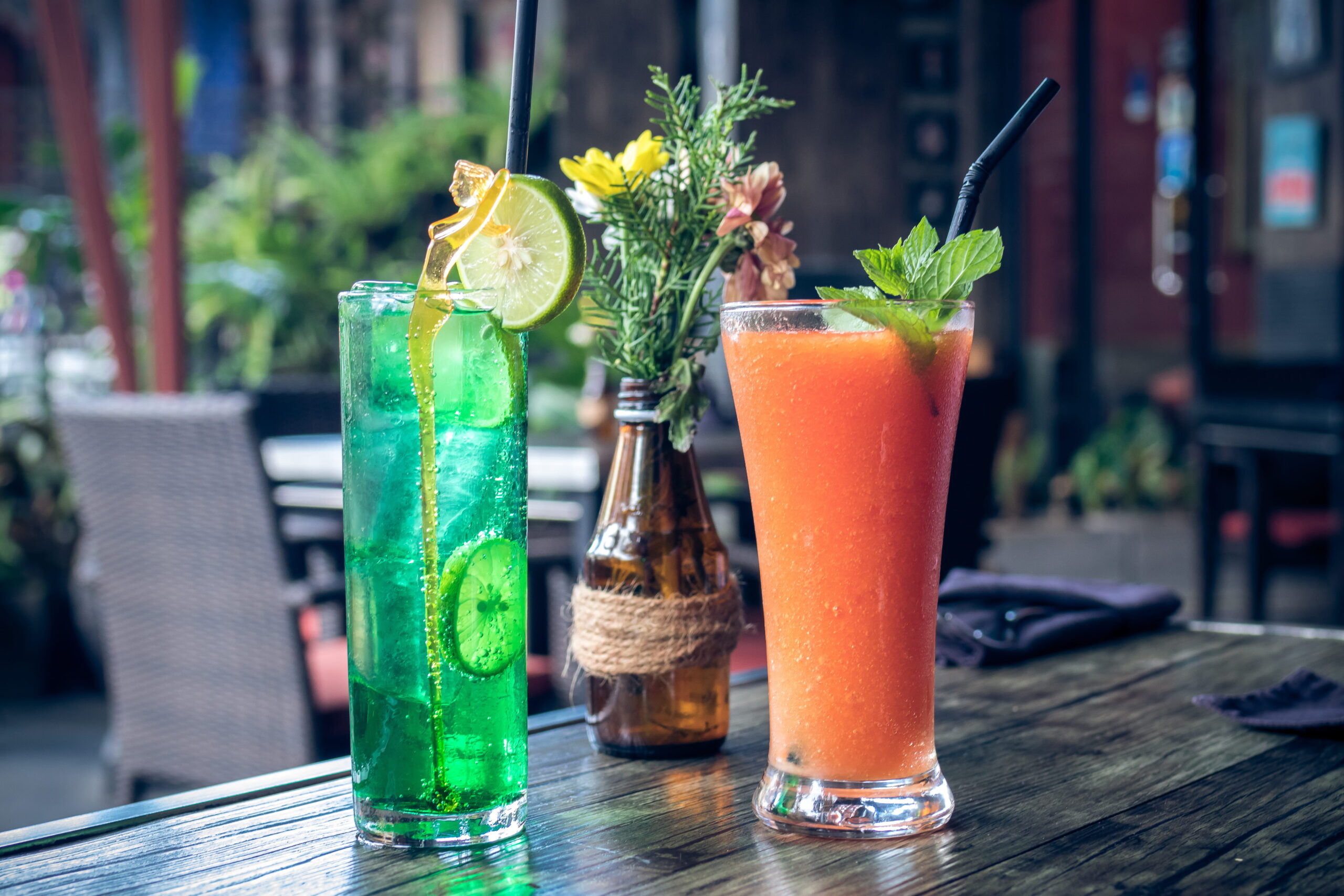 Healthy fruity papaya juice in a glass on a wooden table.
